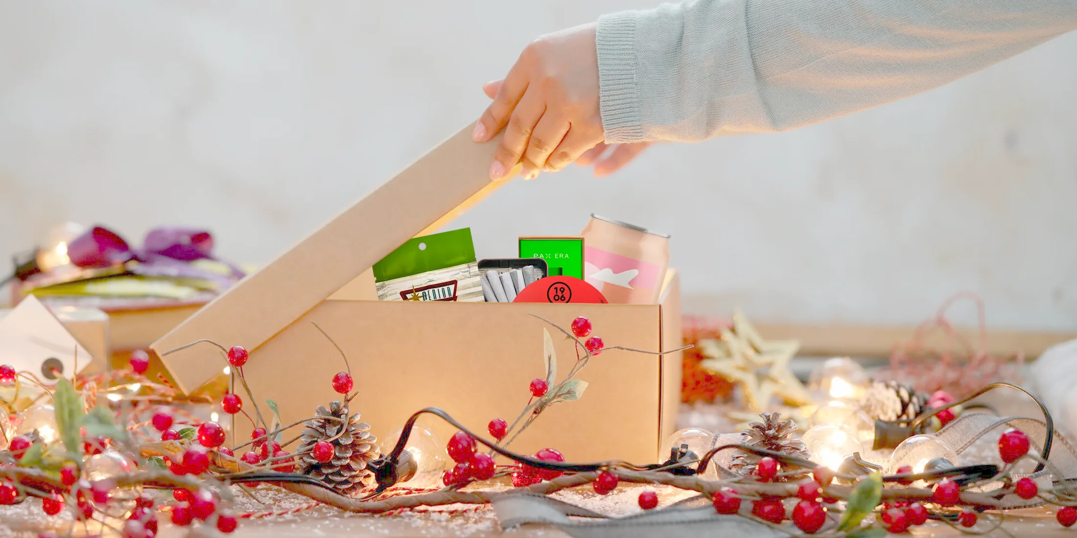 person packaging cannabis gifts.