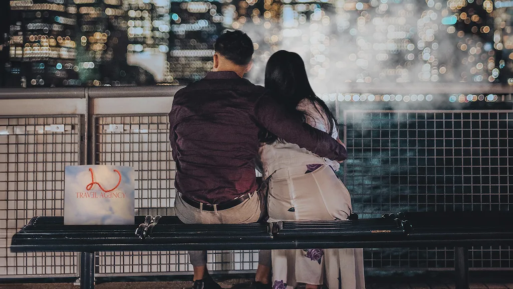 Couple watching fountain in NYC.